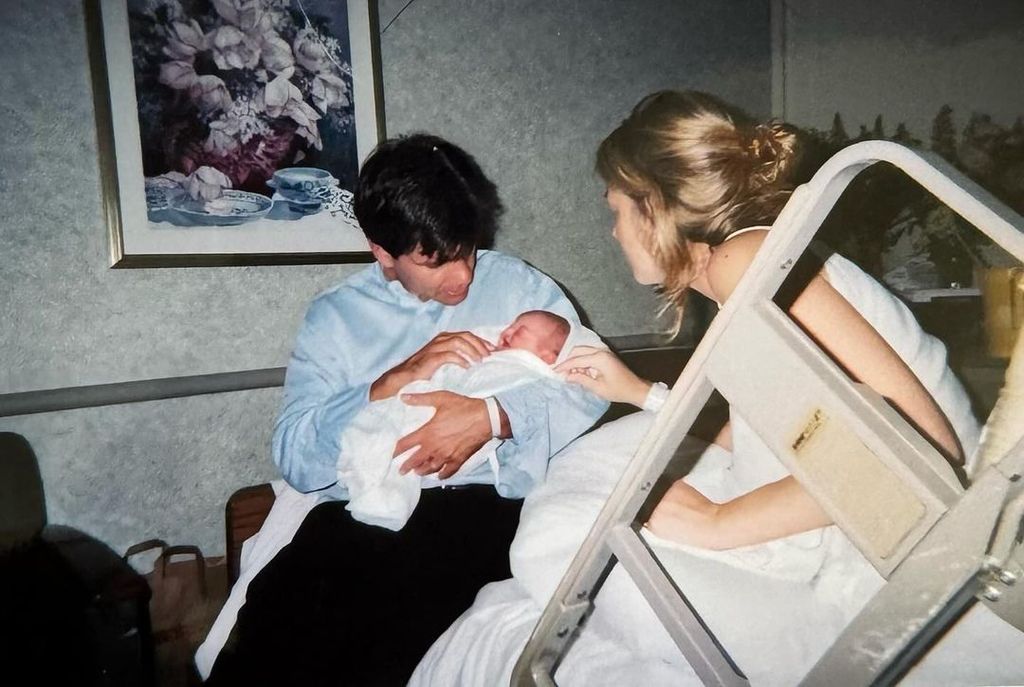 George Stephanopoulos with baby daughter Harper inside his old home in Washington D.C.