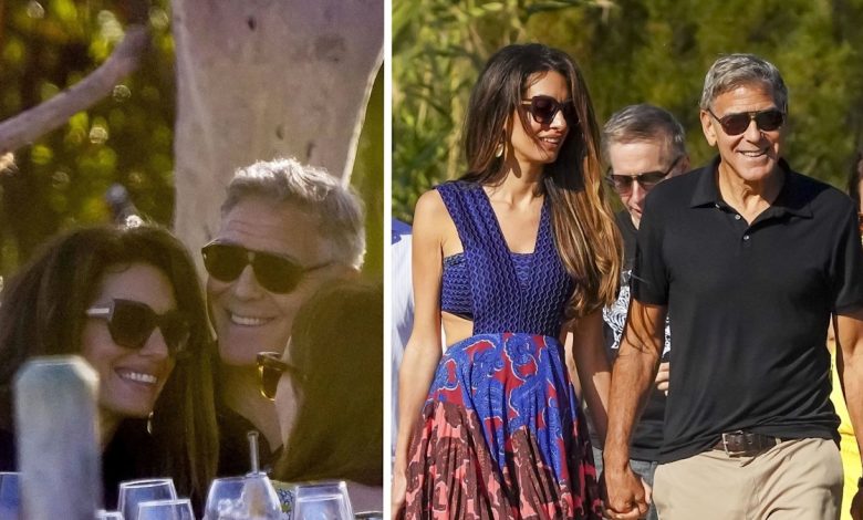 Exclusive: George Clooney can't keep his hands off wife Amal as they enjoy luxury beach date