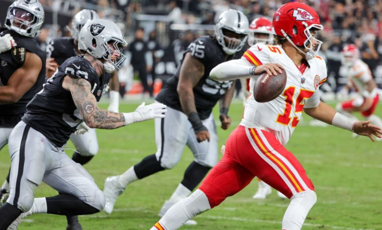 LAS VEGAS, NEVADA - OCTOBER 27: Patrick Mahomes #15 of the Kansas City Chiefs is chased by Maxx Crosby #98 of the Las Vegas Raiders in the third quarter of their game at Allegiant Stadium on October 27, 2024 in Las Vegas, Nevada. The Chiefs defeated the Raiders 27-20. (Photo by Ethan Miller/Getty Images)