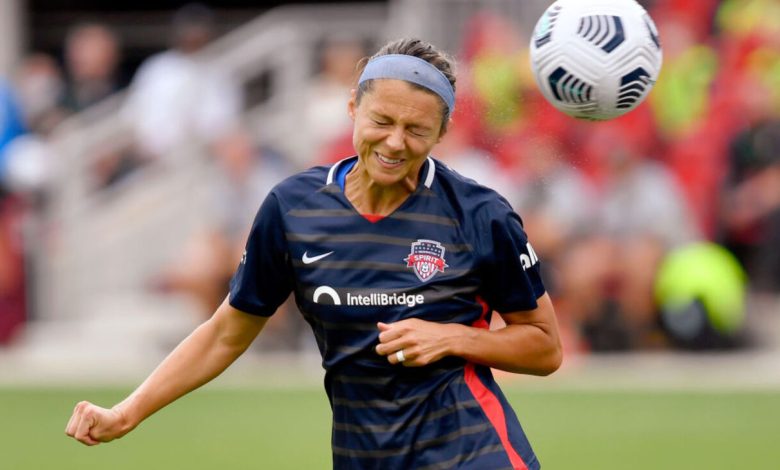 WASHINGTON, DC - AUGUST 22: Washington Spirit forward Ashley Hatch (33) heads a ball toward the goal during the NWSL game between Orlando Pride and Washington Spirit August 22, 2021 at Audi Field in Washington, DC. (Photo by Randy Litzinger/Icon Sportswire via Getty Images)