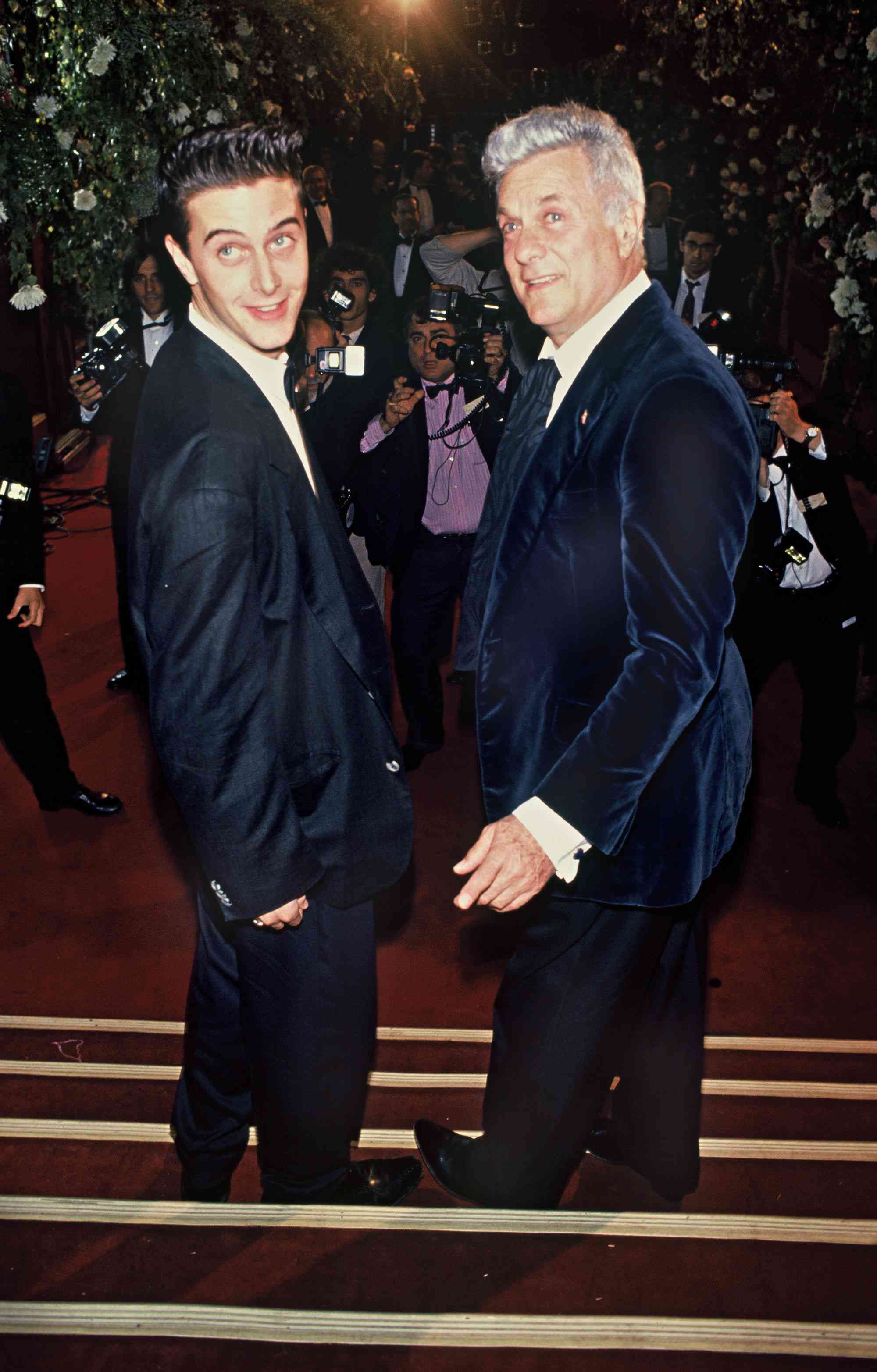 Tony Curtis and son Nicholas during the party for the 100th anniversary of the Moulin Rouge in Paris - 1989 in Paris - 1989. (Photo by Bertrand Rindoff Petroff/Getty Images)