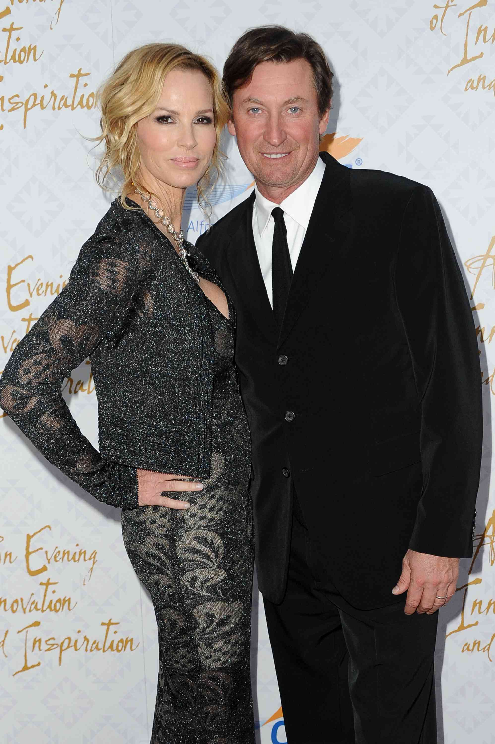 Hockey legend Wayne Gretzky and wife Janet Marie Gretzky attend the 10th annual Alfred Mann Foundation Gala at 9900 Wilshire Blvd on October 13, 2013 in Beverly Hills, California.