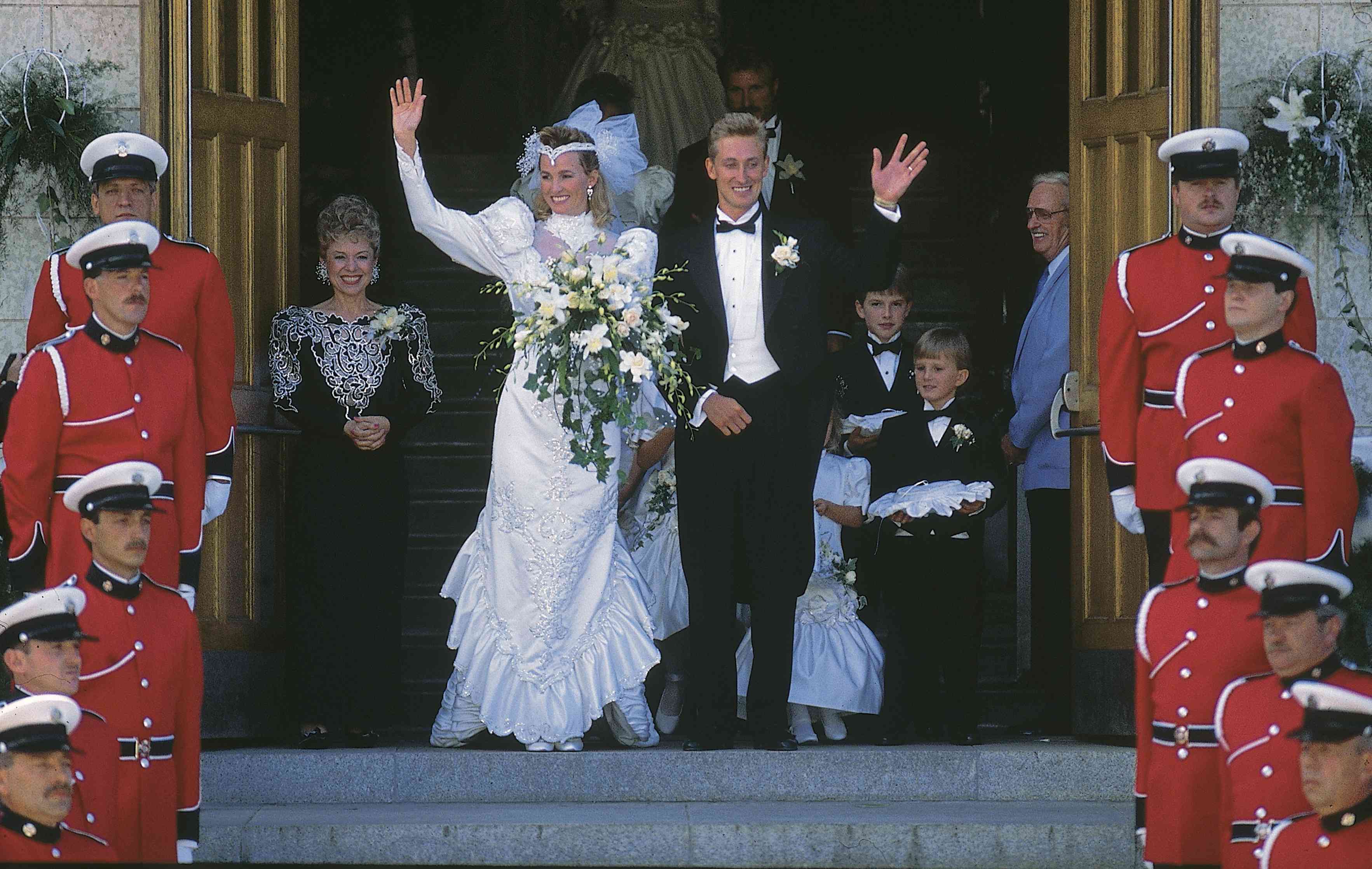 Edmonton Oilers Wayne Gretzky with new wife Janet Jones after their marriage ceremony on July 16th 1988 in Edmonton, Canada.