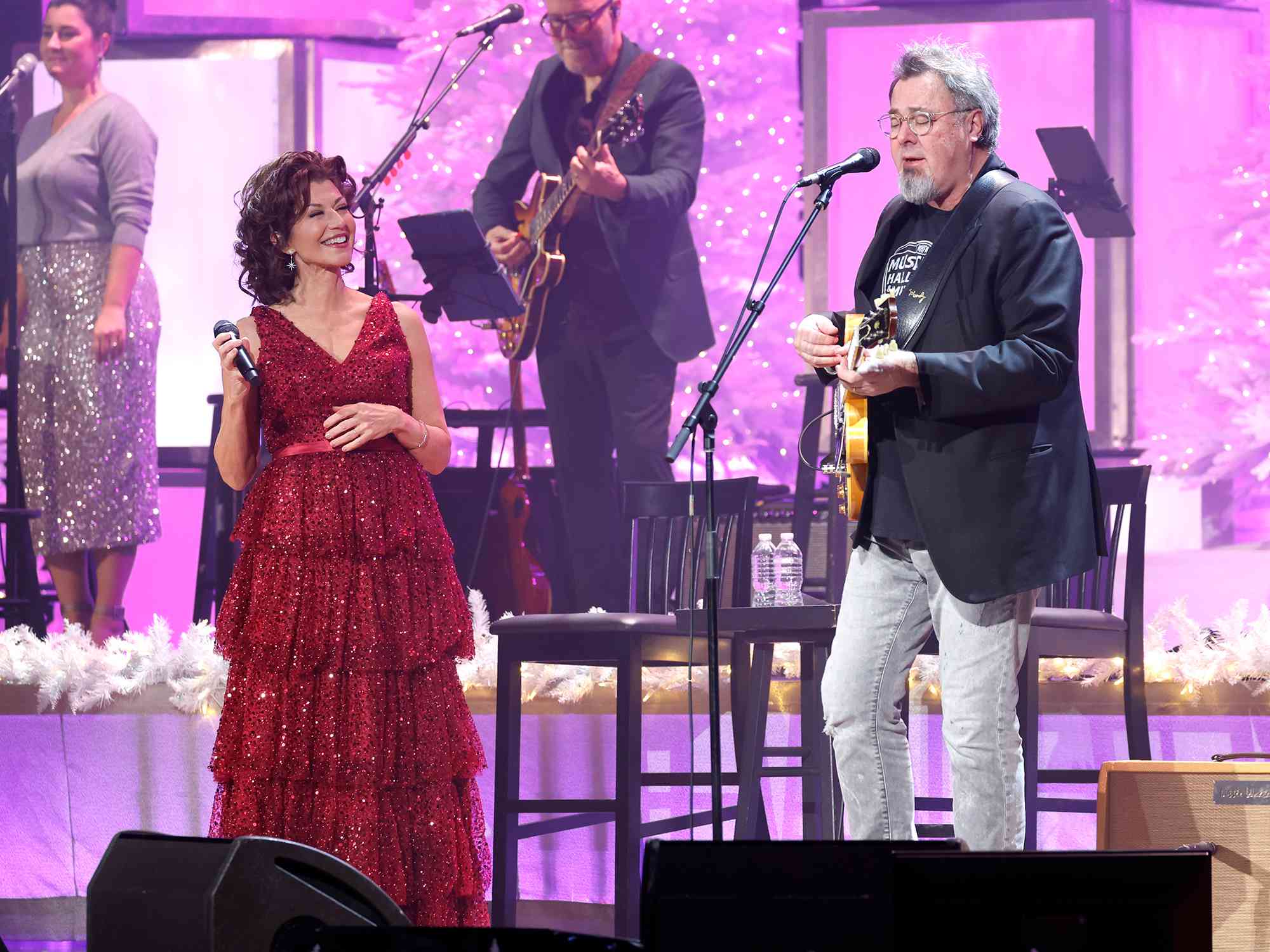 Amy Grant and Vince Gill perform at the Ryman Auditorium on December 13, 2023 in Nashville, Tennessee. 