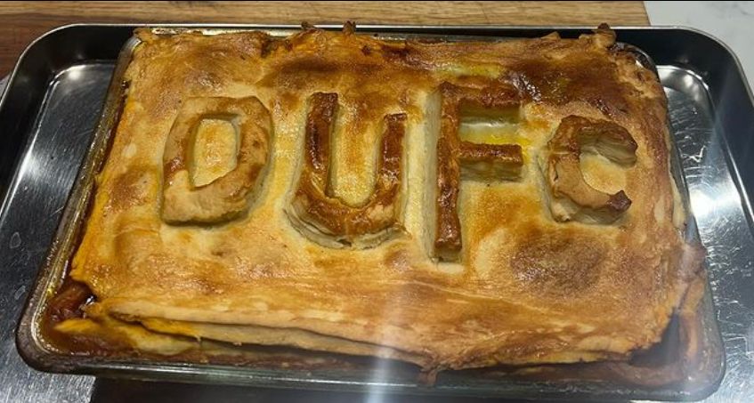  A pie with DUFC written on it