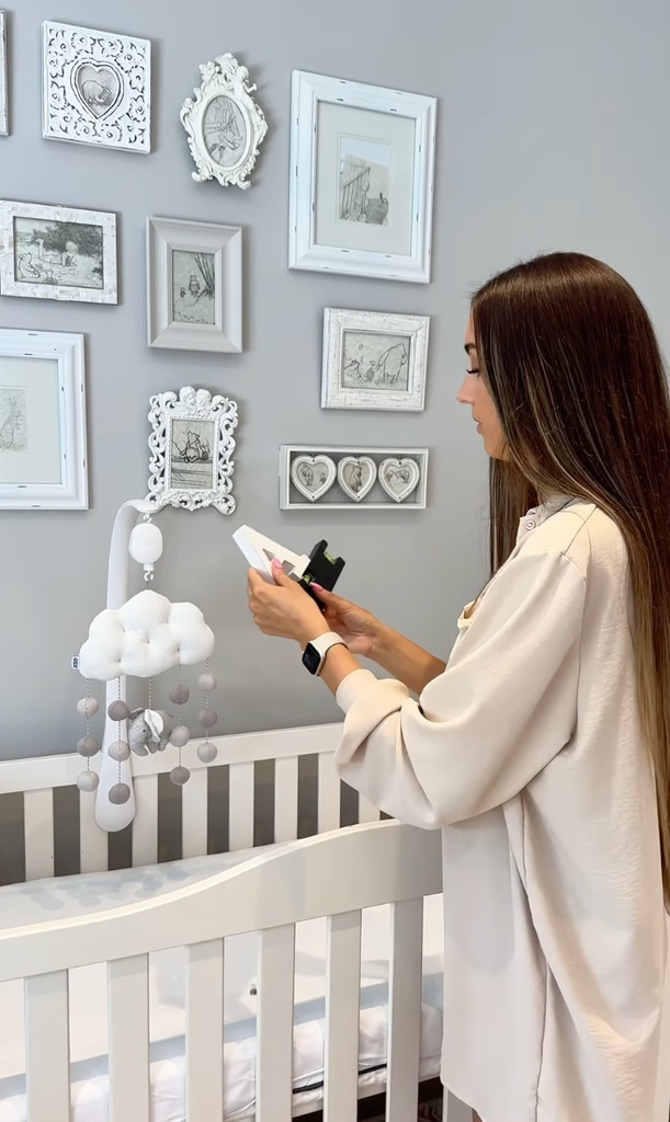 Baby Arabella's nursery is decorated with sentimental pictures that used to decorate her sister's bedroom