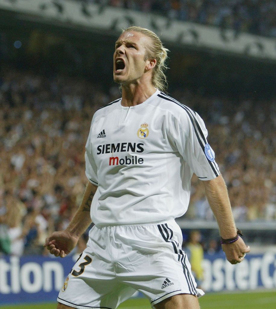 David Beckham of Real Madrid celebrates after the first goal during the UEFA Champions League Group F match between Real Madrid and Olympic Marseille at the Santiago Bernabeu Stadium on September 16, 2003 in Madrid, Spain.