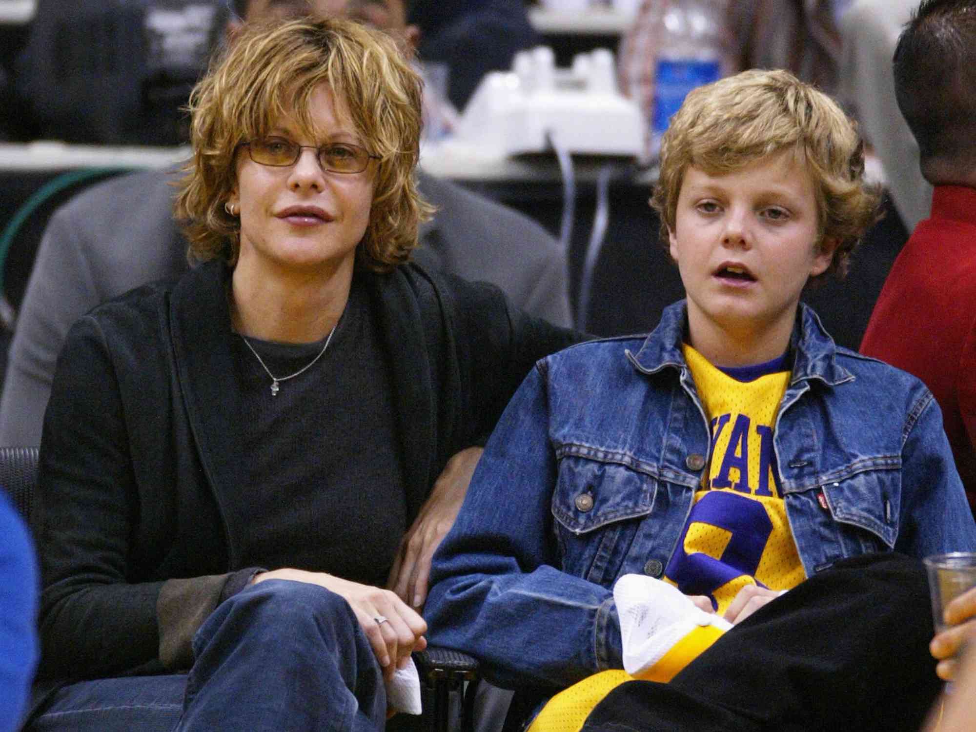 Meg Ryan and son Jack Quaid attend the game between the Los Angeles Lakers and the Portland Trailblazers on April 6, 2004.