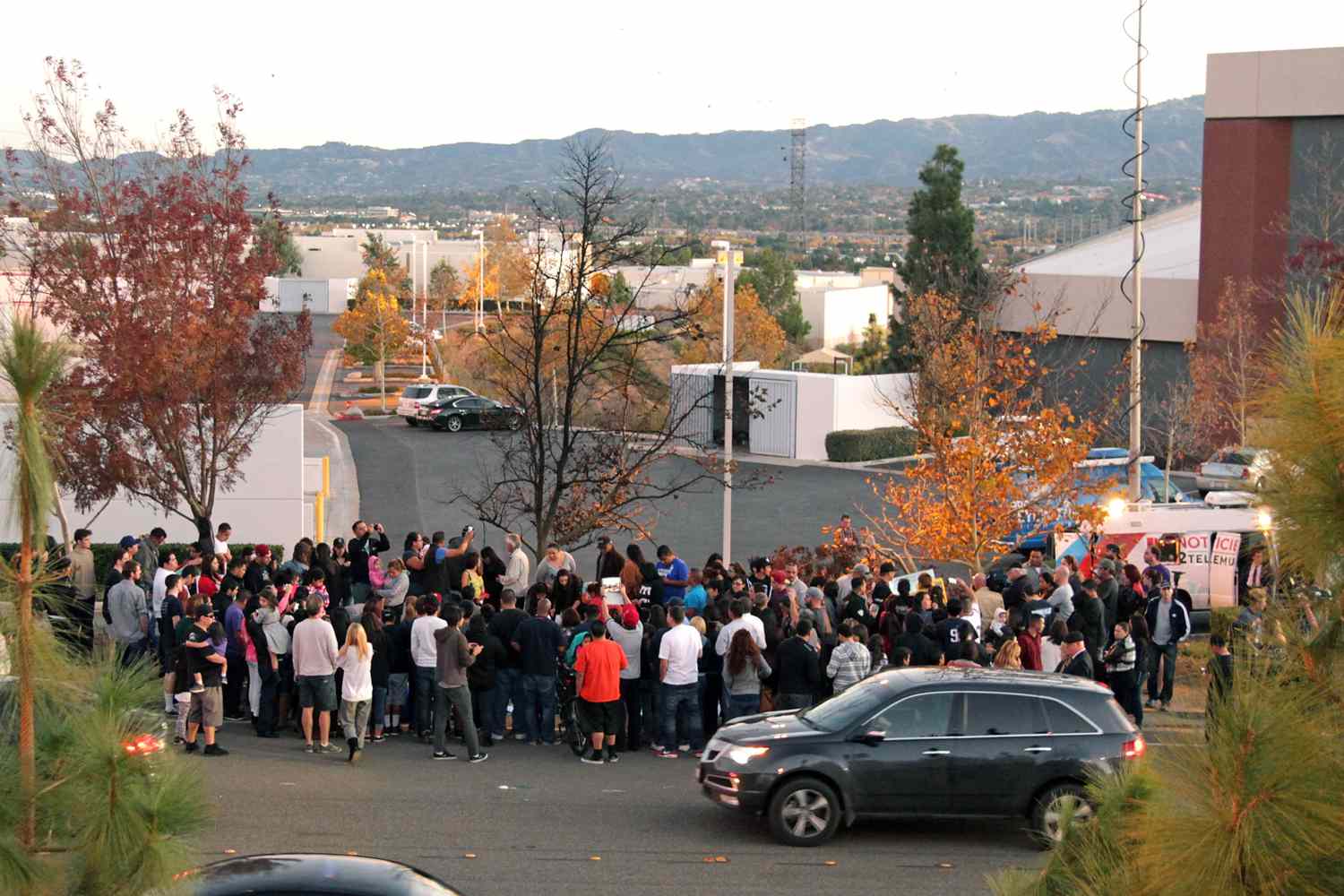  Fans pay tribute to actor Paul Walker at the site of his fatal car accident on December 1, 2013 in Valencia, California. 