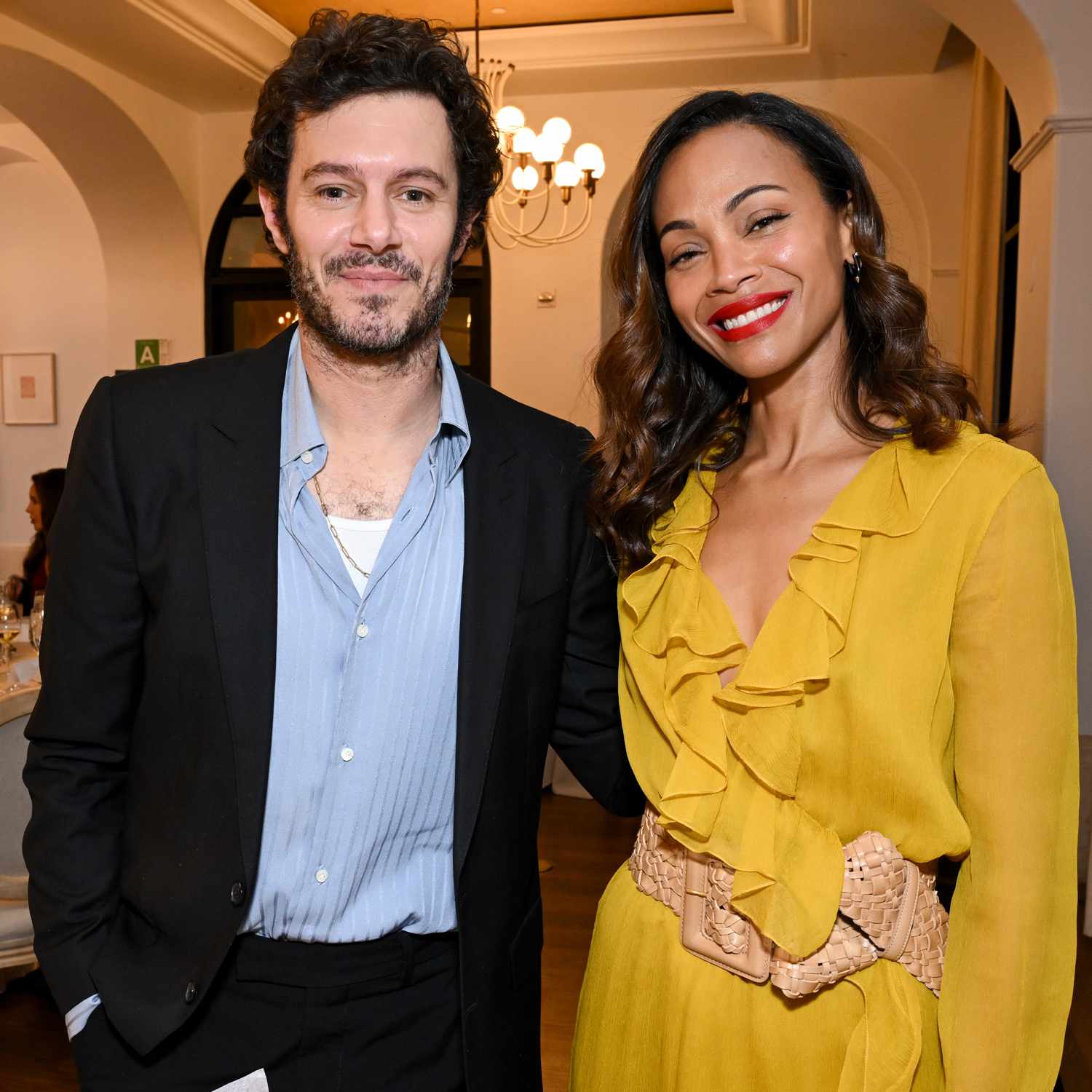 Adam Brody, Zoe Saldana at the Golden Globes First-Time Nominee Luncheon at Maybourne Beverly Hills on December 17, 2024 in Los 