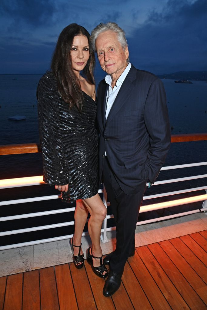 catherine zeta jones michael douglas posing by sea cannes