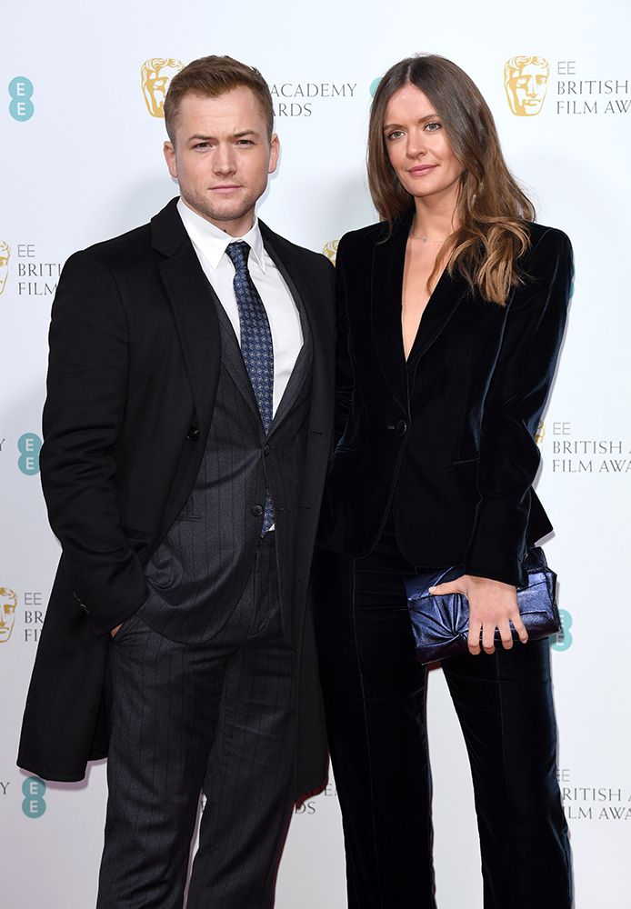 Taron Egerton and Emily Thomas on the BAFTA red carpet