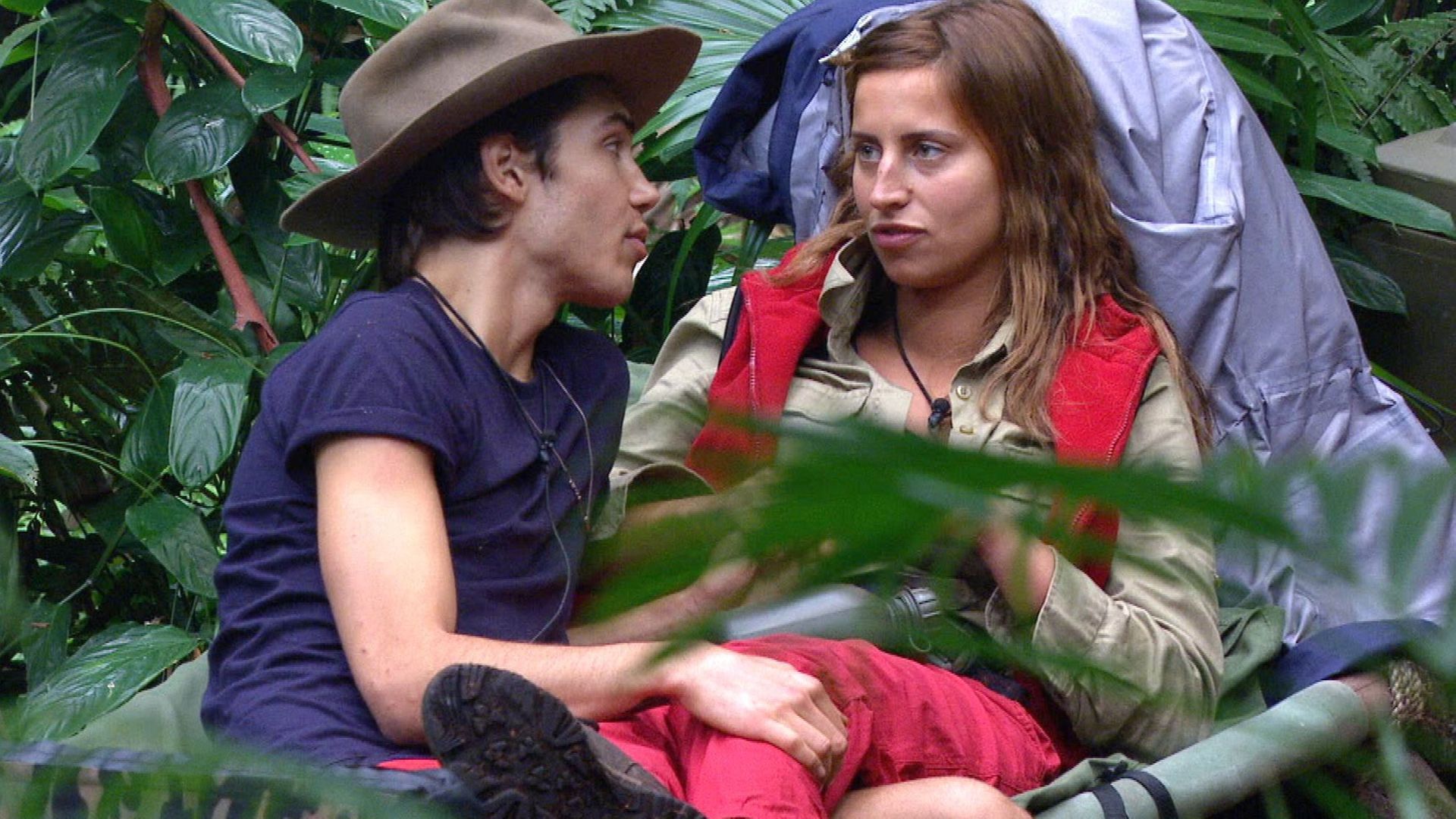 George Shelley and Ferne McCann talking - George's hand is on Ferne's knee