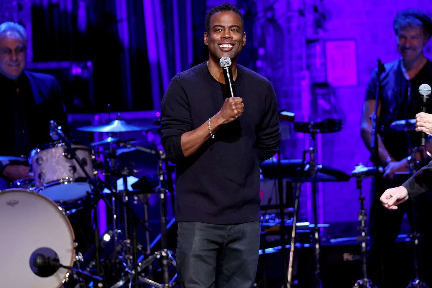 Chris Rock performs onstage during 2023 Night of Too Many Stars benefiting NEXT for AUTISM at Beacon Theatre on December 11, 2023 in New York City.