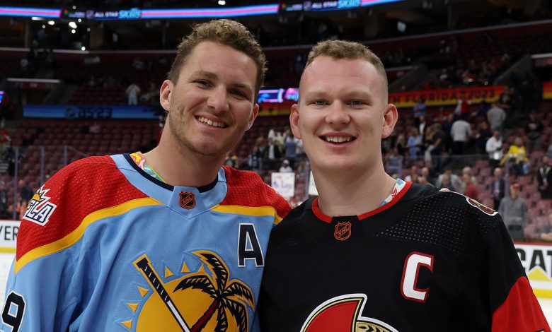 Brady Tkachuk #7 of the Ottawa Senators and Matthew Tkachuk #19 of the Florida Panthers pose together after the 2023 NHL All-Star Skills Competition at FLA Live Arena on February 03, 2023 in Sunrise, Florida.