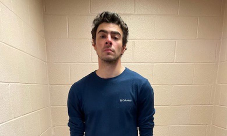 In this handout photo released by the Altoona Police Department, Luigi Mangione is seen in a holding cell after being taken into custody on December 9, 2024 in Altoona, Pennsylvania.