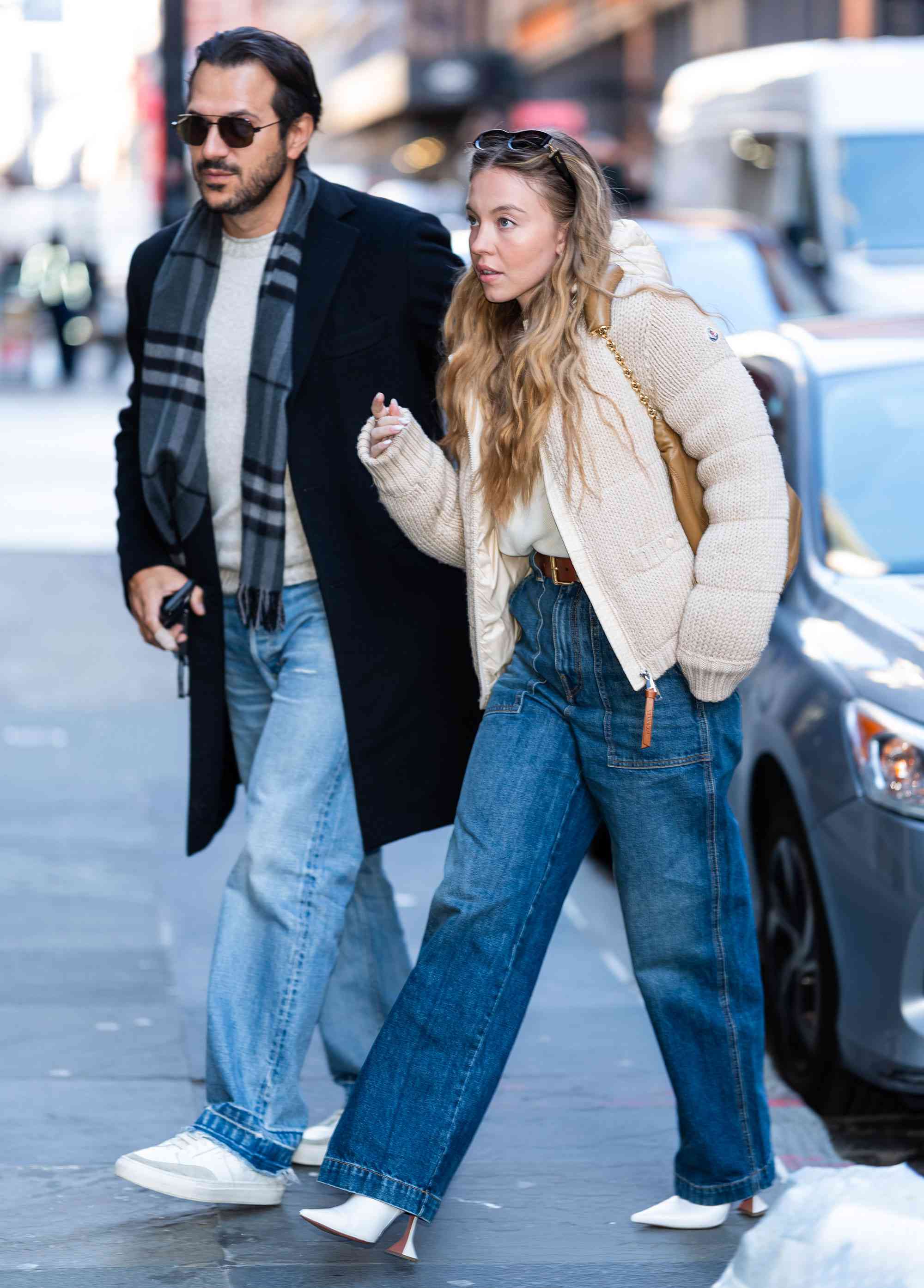 Jonathan Davino (L) and Sydney Sweeney are seen in SoHo on December 14, 2024