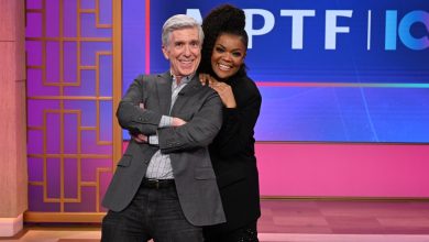 Tom Bergeron and Yvette Nicole Brown pose at a telethon at KTLA 5.