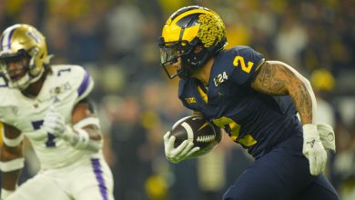 College Football: CFP National Championship: Michigan running back Blake Corum (2) in action, runs with the football vs Washington at NRG Stadium. Houston, TX 1/8/2024 CREDIT: Erick W. Rasco (Photo by Erick W. Rasco/Sports Illustrated via Getty Images) (Set Number: X164476 TK1)