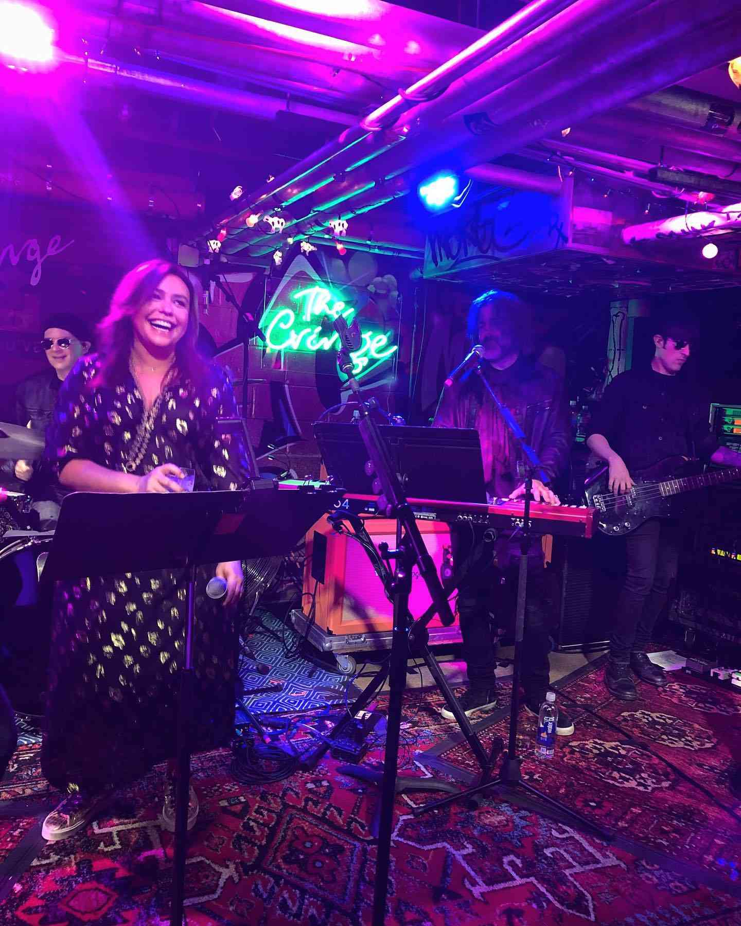 Rachael Ray sings with her husband John Cusimano and band 'The Cringe' on stage.