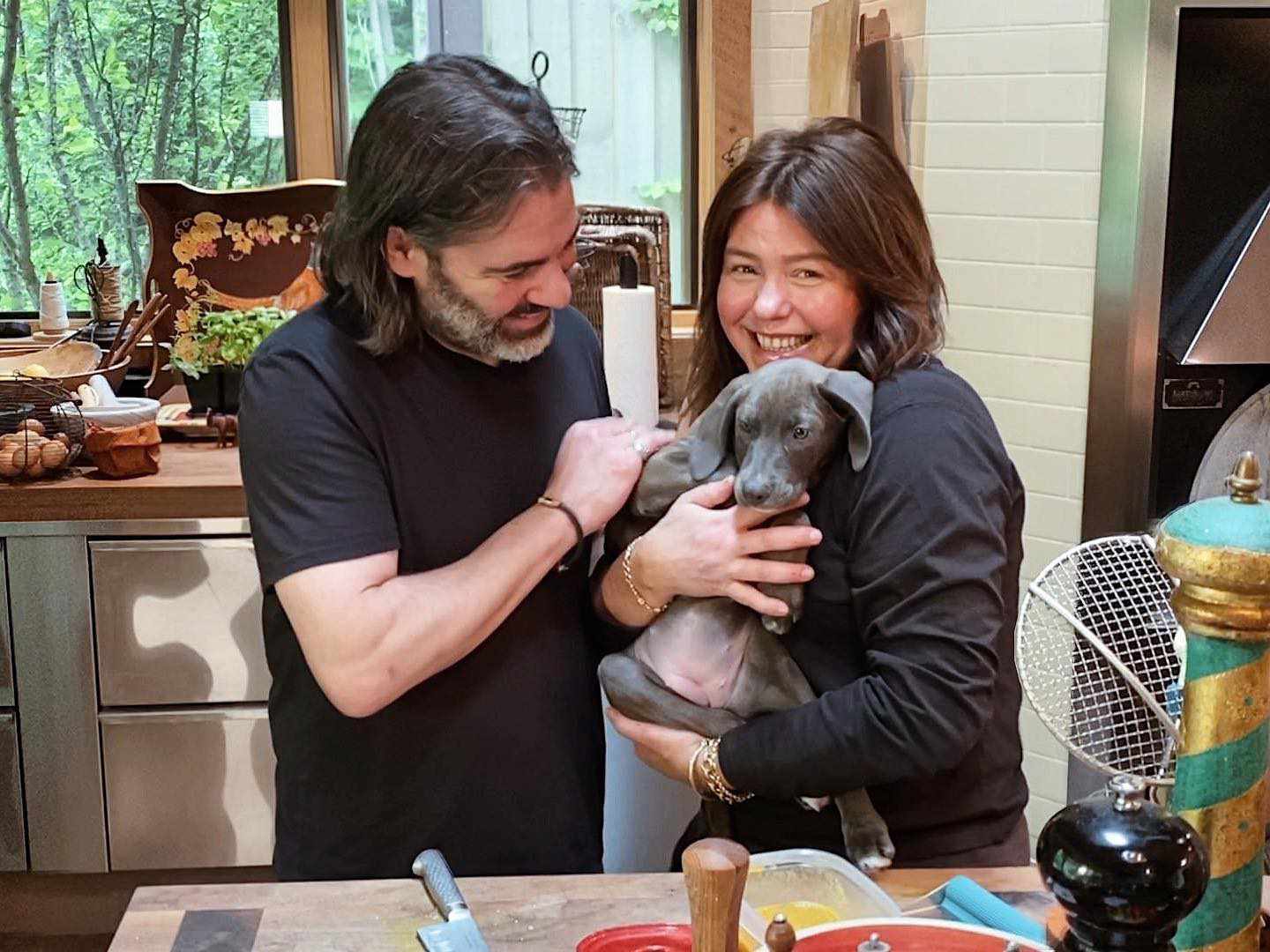 Rachael Ray and husband John Cusimano on The Rachael Ray Show with their new puppy Bella Boo Blue. 