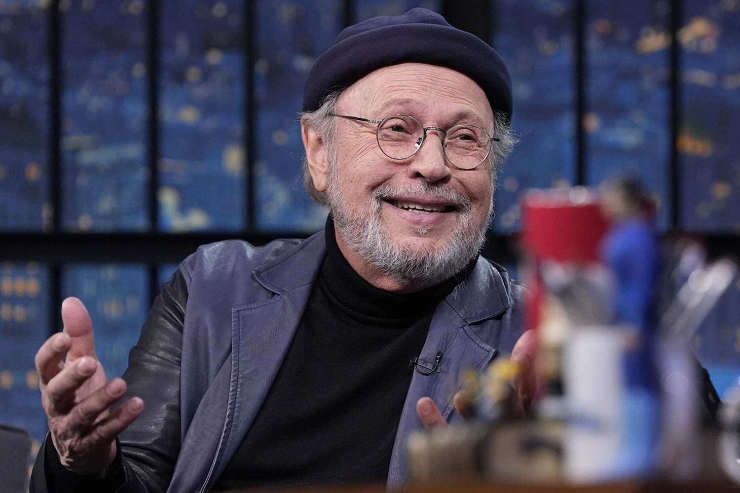 Actor Billy Crystal during an interview with host Seth Meyers