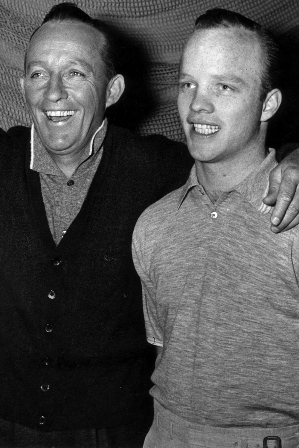 Bing Crosby and son Dennis Crosby on the set of director Frank Tashlin's film, 'Say One For Me'.