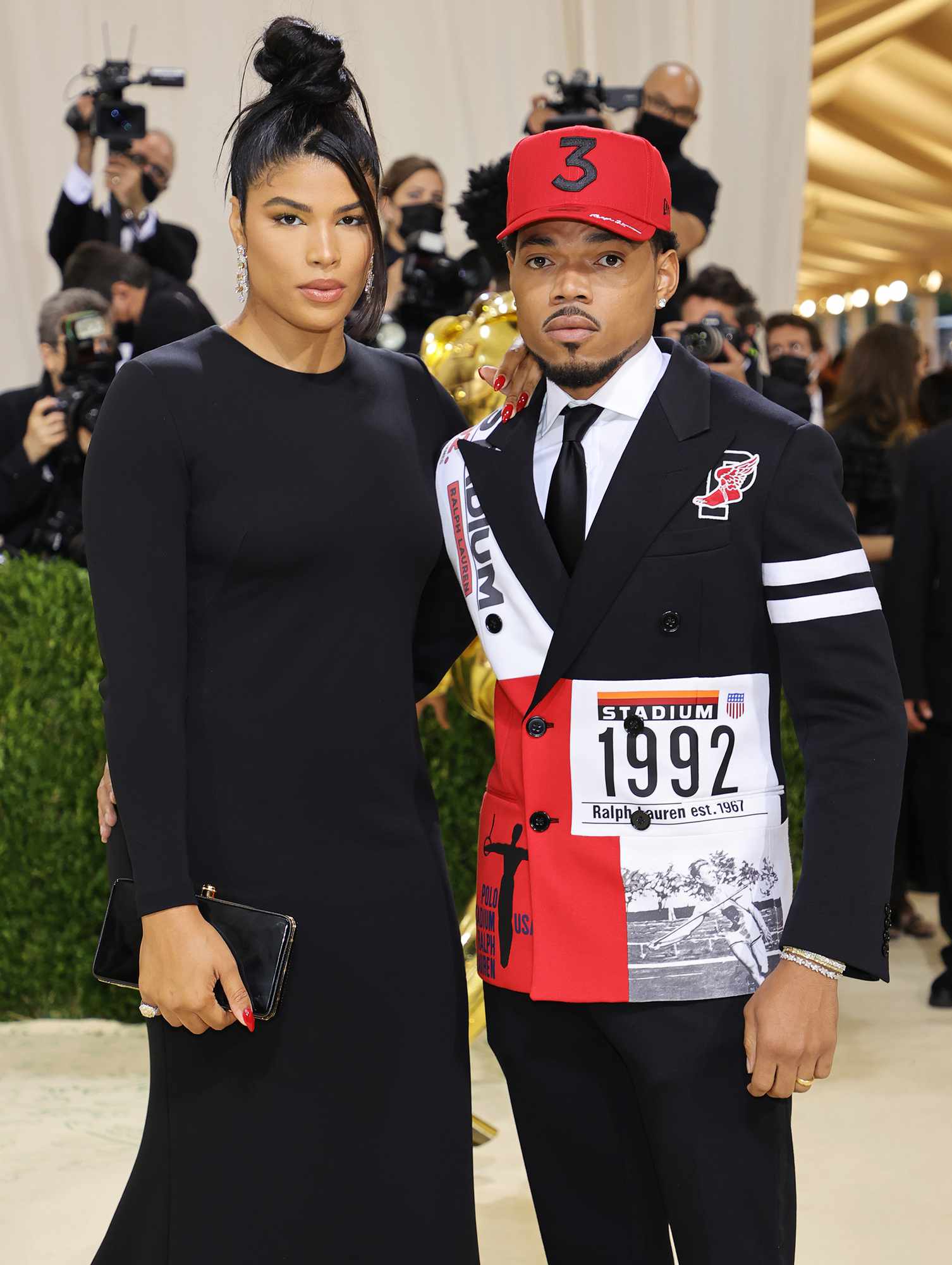 Chance the Rapper and Kirsten Corley attend The 2021 Met Gala Celebrating In America: A Lexicon Of Fashion at Metropolitan Museum of Art on September 13, 2021 in New York City