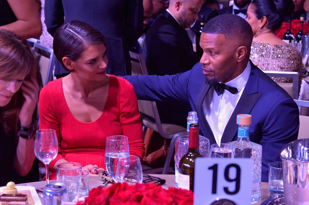 Jamie Foxx and Katie Holmes look tense during event