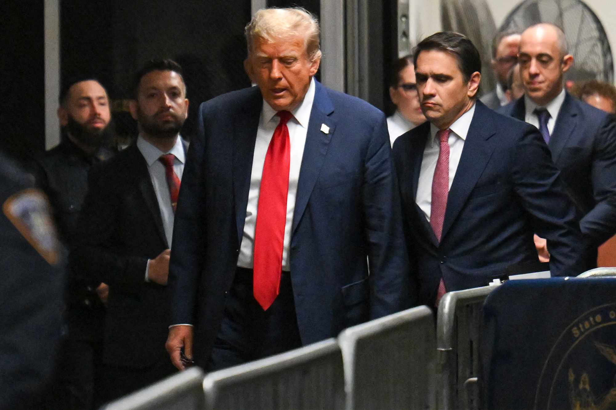 Former US President Donald Trump attends the first day of his trial for allegedly covering up hush money payments linked to extramarital affairs, at Manhattan Criminal Court in New York City on April 15, 2024.