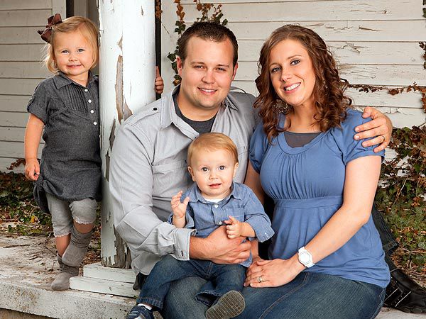 Josh Duggar with wife Anna Duggar and their two children.