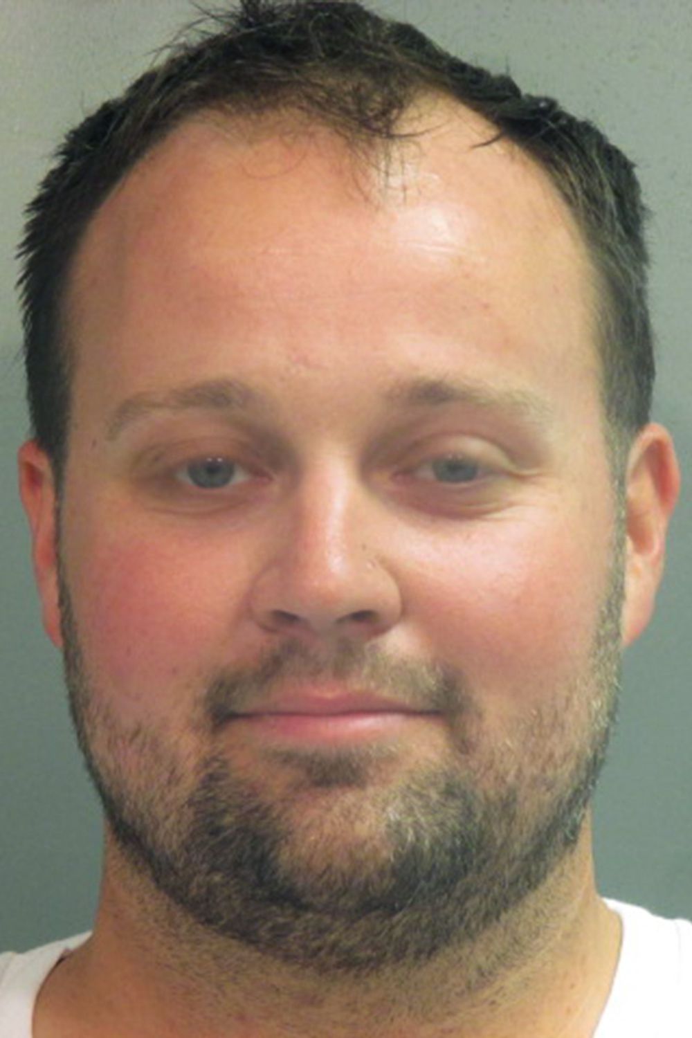 Josh Duggar poses for a booking photo after his arrest April 29, 2021 in Fayetteville, Arkansas.