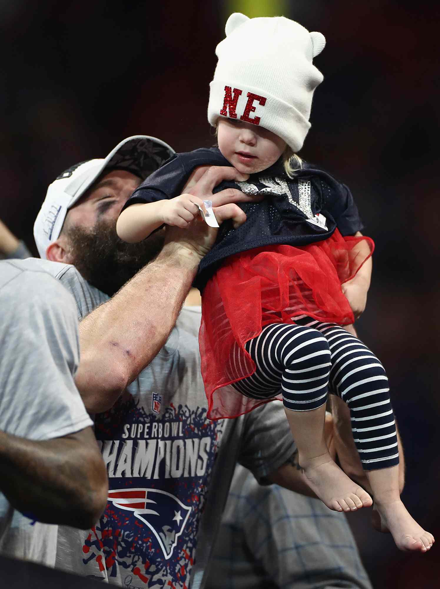 Julian Edelman celebrates with his daughter Lily at the end of the Super Bowl LIII at Mercedes-Benz Stadium on February 3, 2019.