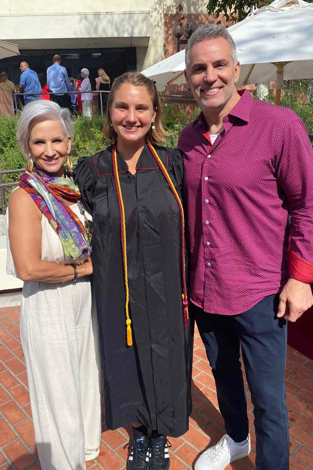 Kurt Warner and wife Brenda Warner support their daughter Jada Jo as she graduates from the University of Southern California Drama School.