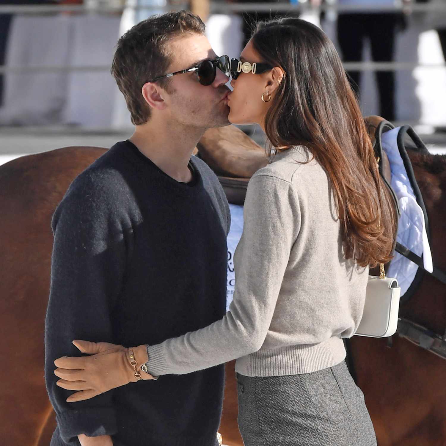 Paul Wesley and girlfriend Natalie Kuckenburg share a kiss on the snow in Aspen, Colorado.