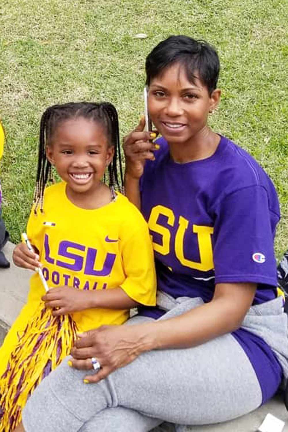 Randy Moss' daughter, Randi Moss and her mother.