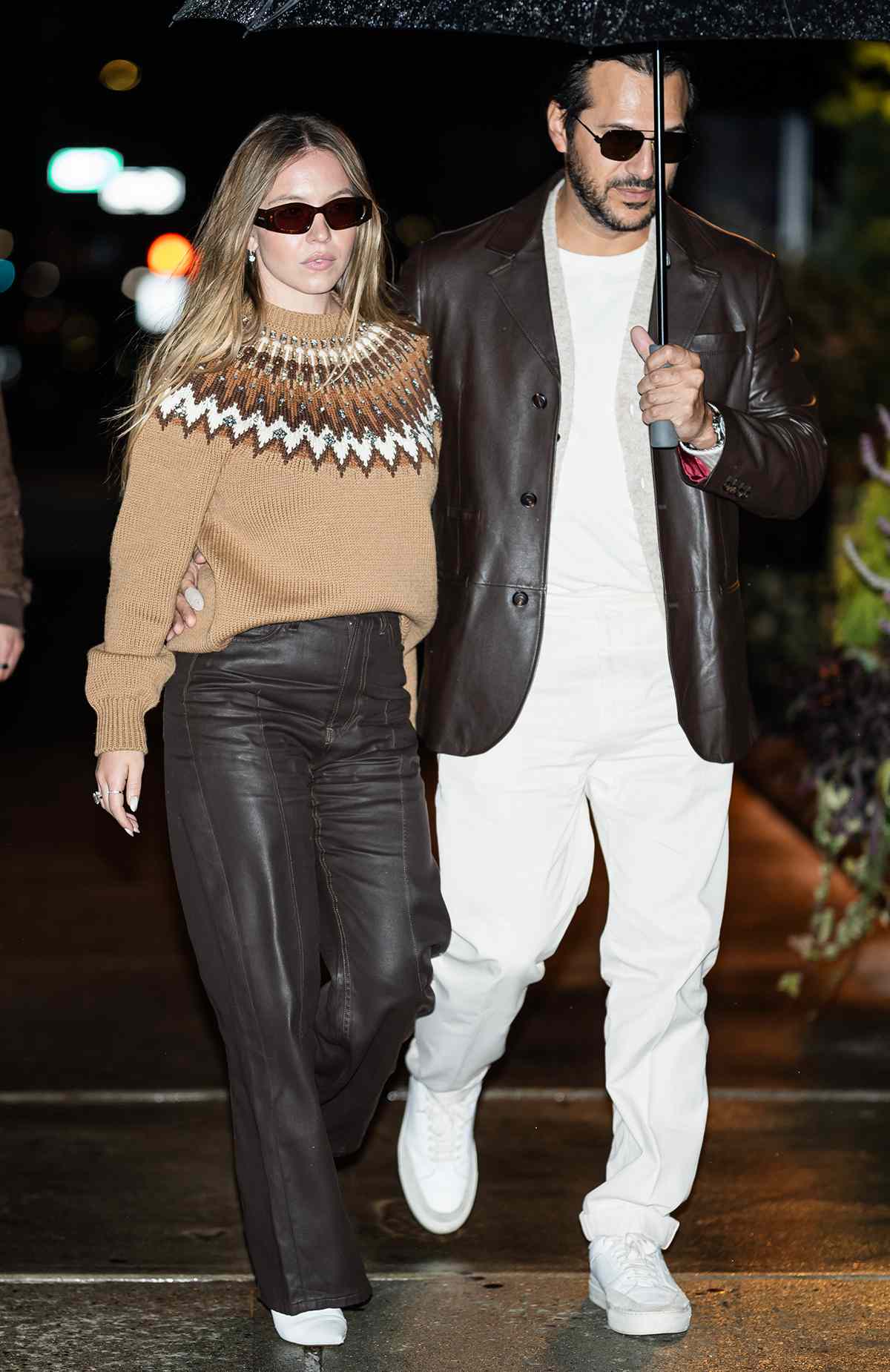 Sydney Sweeney (L) and Jonathan Davino are seen in Chelsea on December 15, 2024 in New York City