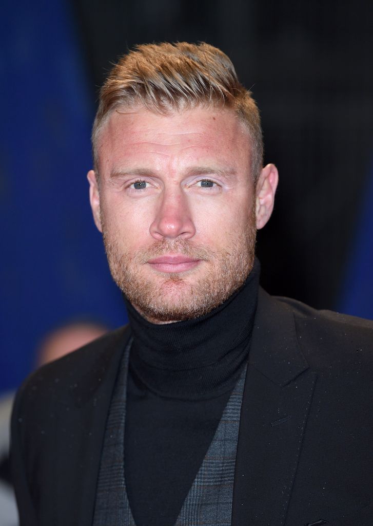 Freddie Flintoff in a black suit