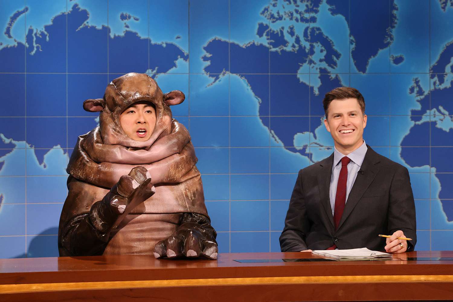 SATURDAY NIGHT LIVE -- Episode 1865 -- Pictured: (l-r) Bowen Yang as Moo Dang the hippo and Colin Jost during Weekend Update on Saturday, September 28, 2024 -- 