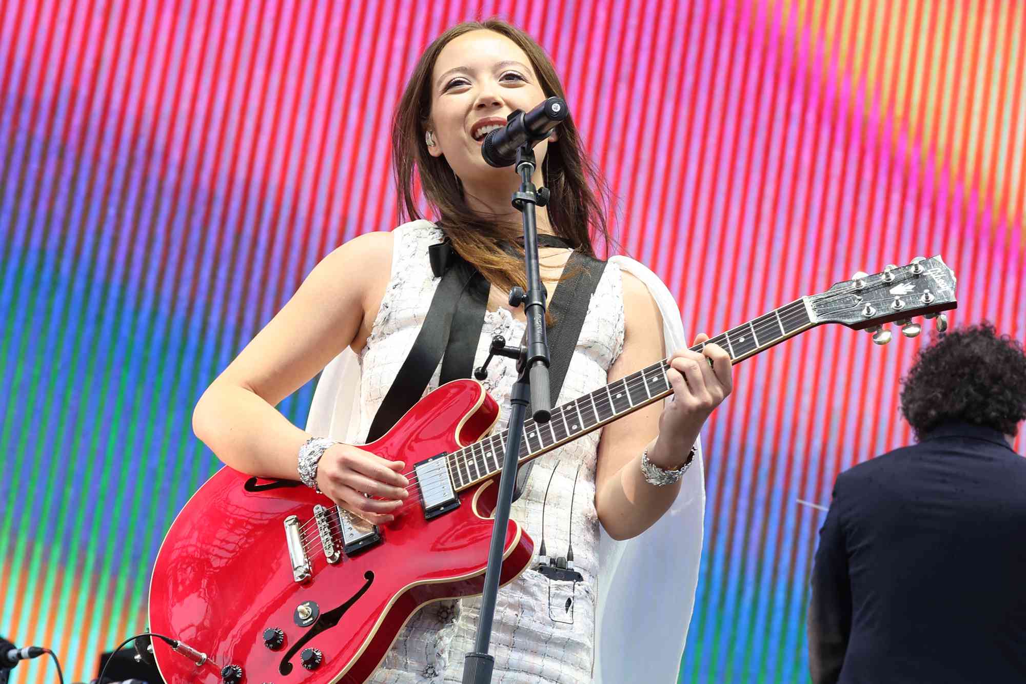 Laufey performs on stage with Venezuelan conductor Gustavo Dudamel and the LA Philarmonic during the 2025 Coachella Valley Music and Arts Festival