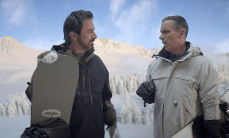 Ray Romano and Sebastian Maniscalco in the 2026 NBC Winter Olympics commercial.
