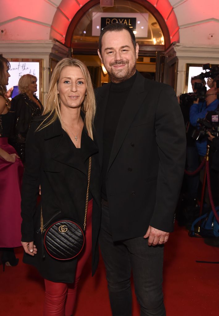Joanne Mas and Danny Dyer outside of a theatre