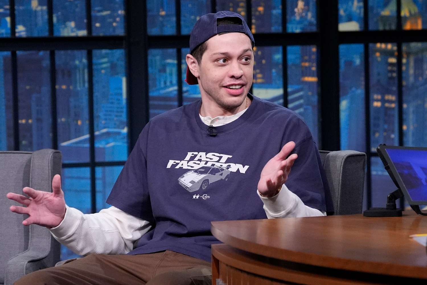 Comedian Pete Davidson during an interview with host Seth Meyers
