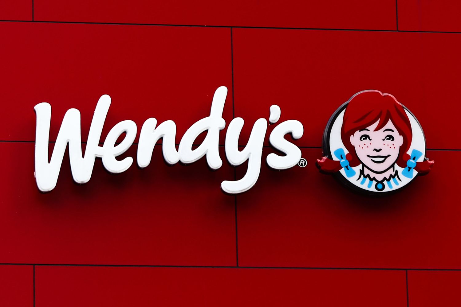Wendy's logo sign is seen in New York, United States, on October 26, 2022