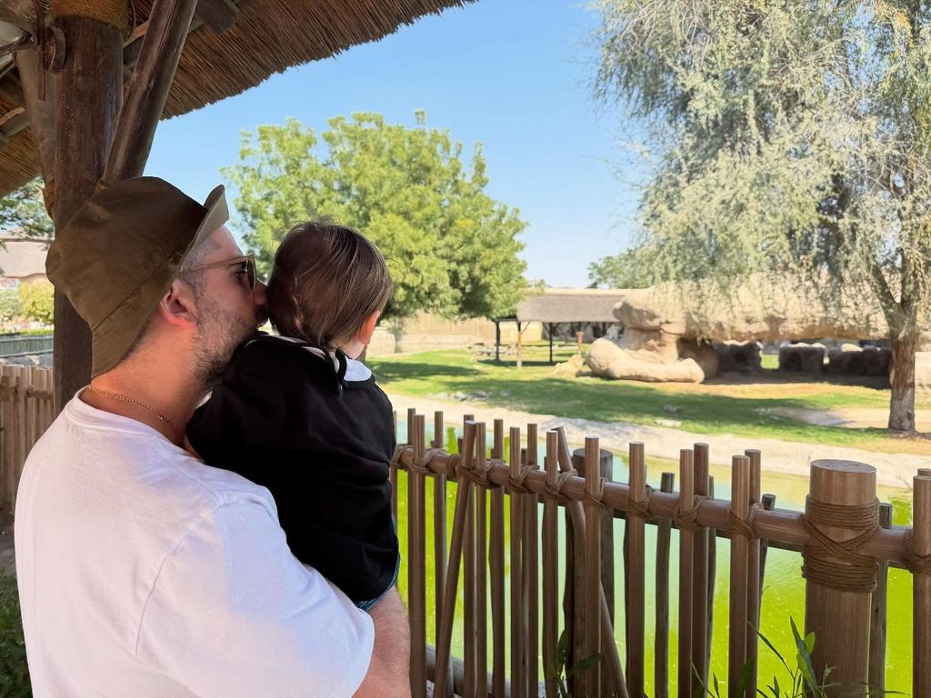 lindsay lohan husband holding son at the zoo