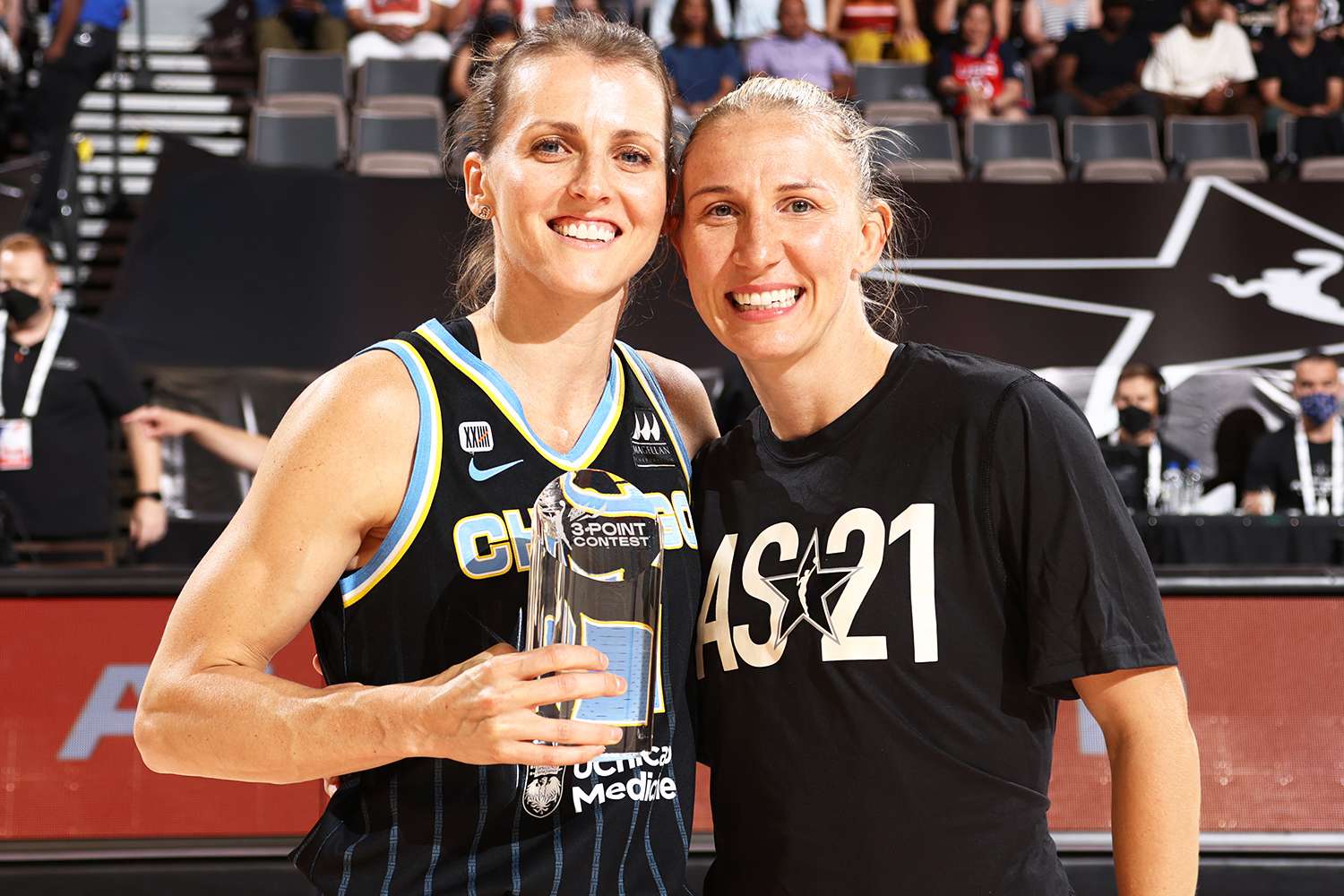 Allie Quigley #14 of the Chicago Sky and Courtney Vandersloot #22 of Team WNBA pose for a photo during the WNBA Mtn Dew 3-Point Contest during the AT&T WNBA All-Star Game 2021 on July 14, 2021 at Michelob ULTRA Arena in Las Vegas, Nevada.