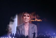 screen shows Canadian singer Celine Dion giving a recorded message during the first semi-final of the Eurovision Song Contest 2025, at the St. Jakobshalle arena in Basel on May 13, 2025. (Photo by SEBASTIEN BOZON / AFP) (Photo by SEBASTIEN BOZON/AFP via Getty Images)