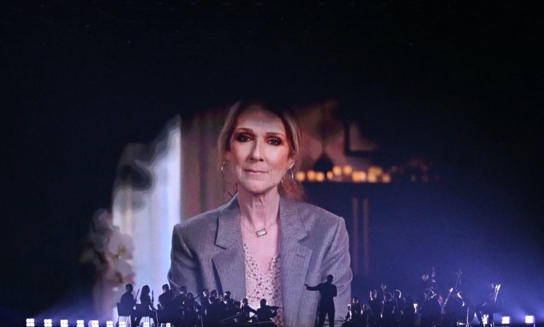 screen shows Canadian singer Celine Dion giving a recorded message during the first semi-final of the Eurovision Song Contest 2025, at the St. Jakobshalle arena in Basel on May 13, 2025. (Photo by SEBASTIEN BOZON / AFP) (Photo by SEBASTIEN BOZON/AFP via Getty Images)