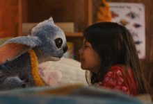 (L-R) Stitch and Maia Kealoha as Lilo in Disney’s live-action Lilo and Stitch