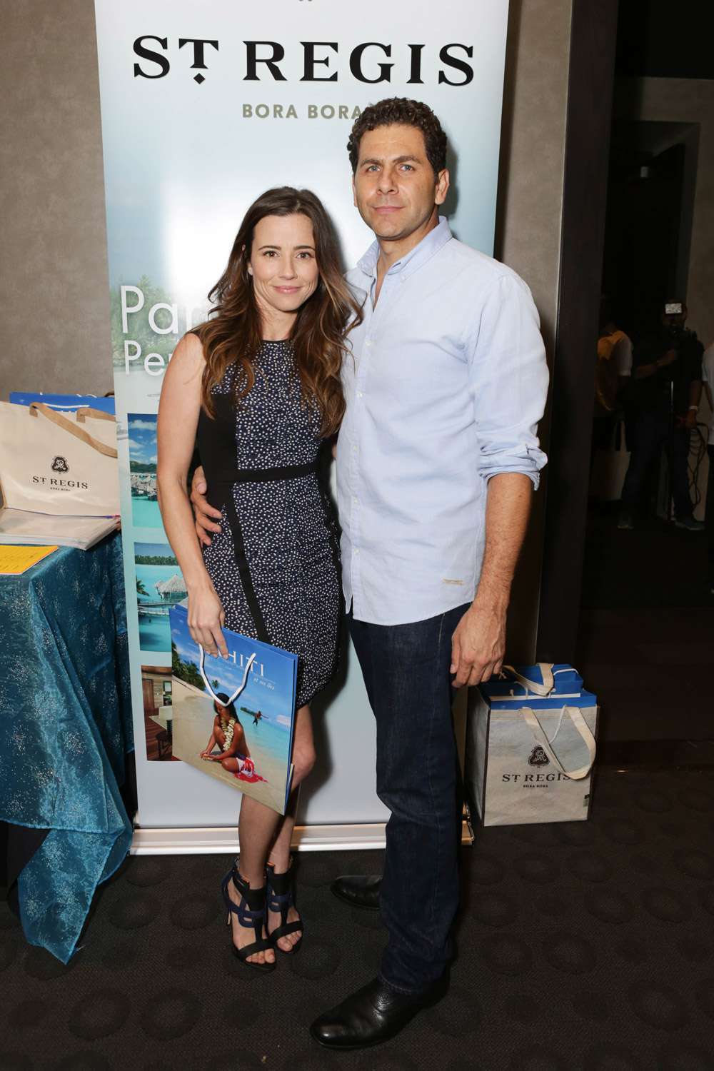 Linda Cardellini and Steven Rodriguez attends the GBK Productions Luxury Lounge during Emmy's Weekend on September 20, 2013 in Hollywood, California.